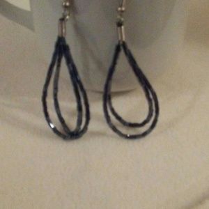 Various unique earrings...